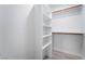 A walk-in closet with shelves and hanging rods providing ample storage solutions at 188 Carthage St, Henderson, NV 89074
