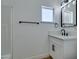 Bathroom features white cabinetry, updated fixtures, and a modern design at 212 View Dr, Las Vegas, NV 89107