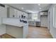 Modern kitchen features gray cabinets, stainless appliances, and sleek countertops at 212 View Dr, Las Vegas, NV 89107