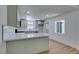 Modern kitchen features gray cabinets, stainless appliances, and sleek countertops at 212 View Dr, Las Vegas, NV 89107