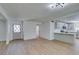 Bright, open living space with new floors, modern light fixture and new front door at 212 View Dr, Las Vegas, NV 89107