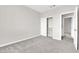 Neutral bedroom with carpet and a sliding-door closet with shelves at 2257 Norway Pine Ct, Las Vegas, NV 89134