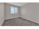 Neutral bedroom with carpet and a shuttered window at 2257 Norway Pine Ct, Las Vegas, NV 89134