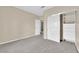 Neutral bedroom with carpet and sliding-door closet with shelving at 2257 Norway Pine Ct, Las Vegas, NV 89134