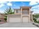 Charming home with a two-car garage, balcony, and manicured lawn at 2257 Norway Pine Ct, Las Vegas, NV 89134