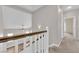 Bright hallway with a view of the living room and hallway with white walls at 2257 Norway Pine Ct, Las Vegas, NV 89134