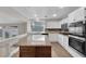 Elegant kitchen with granite countertops and stainless steel double oven at 2257 Norway Pine Ct, Las Vegas, NV 89134