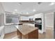 Modern kitchen featuring white cabinets, granite countertops, and stainless appliances at 2257 Norway Pine Ct, Las Vegas, NV 89134
