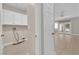 Convenient laundry area with washer/dryer hookups and storage cabinets at 2257 Norway Pine Ct, Las Vegas, NV 89134
