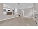 Open living room with fireplace featuring pass through to the kitchen at 2257 Norway Pine Ct, Las Vegas, NV 89134
