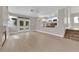 Open living room with fireplace and French doors to the backyard at 2257 Norway Pine Ct, Las Vegas, NV 89134