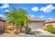 Charming home with a well-maintained front yard and a spacious two-car garage at 2920 Riarosa Ct, North Las Vegas, NV 89086