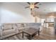 Spacious living area with wood-look floors and an open layout, perfect for entertaining at 2920 Riarosa Ct, North Las Vegas, NV 89086