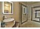 Modern bathroom with a vessel sink, modern faucet, and stylish glass enclosed shower at 2926 E Eldorado Ln, Las Vegas, NV 89120