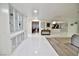 Bright hallway with built-in cabinets that leads to an open-concept kitchen at 2926 E Eldorado Ln, Las Vegas, NV 89120