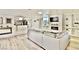 Comfortable living room with a modern fireplace and light wood flooring at 2926 E Eldorado Ln, Las Vegas, NV 89120