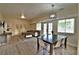 Bright open floor plan with a dining area and living room with wood floors at 2926 E Eldorado Ln, Las Vegas, NV 89120