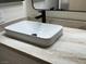 Close-up of bathroom vanity with a rectangular sink and light countertops at 3005 Treasure Island Rd, Las Vegas, NV 89128