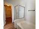 Bright bathroom features a separate glass-enclosed shower and a soaking tub at 3005 Treasure Island Rd, Las Vegas, NV 89128