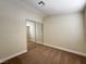 Bright bedroom features a closet with mirrored doors and neutral-toned walls at 3005 Treasure Island Rd, Las Vegas, NV 89128