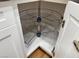 Corner kitchen cabinet with rotating, wire shelving for maximizing storage at 3005 Treasure Island Rd, Las Vegas, NV 89128
