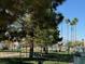 Well-maintained community park featuring green spaces, picnic areas, and recreational facilities for residents at 3005 Treasure Island Rd, Las Vegas, NV 89128