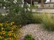 Community entrance featuring lush landscaping and attractive signage at 3005 Treasure Island Rd, Las Vegas, NV 89128