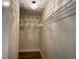 Organized walk-in closet with ample shelving and overhead lighting at 3005 Treasure Island Rd, Las Vegas, NV 89128
