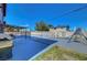 Large backyard with covered patio, pool, playground, and secure fencing, ideal for Gathering fun at 3018 Burnham Ave, Las Vegas, NV 89169