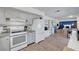 Open kitchen featuring modern appliances and seamless integration with the living space at 3018 Burnham Ave, Las Vegas, NV 89169