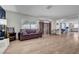 Spacious living room featuring hardwood floors and lots of natural light at 3018 Burnham Ave, Las Vegas, NV 89169