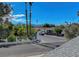 City neighborhood featuring the Stratosphere in the distance, lots of trees and houses at 3018 Burnham Ave, Las Vegas, NV 89169