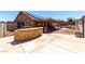 Spacious backyard featuring a patio area, outdoor bar, and landscaped areas, ideal for relaxation at 307 Oak Canyon Dr, Henderson, NV 89015