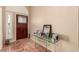 Inviting entryway featuring a dark wood door and tiled flooring at 307 Oak Canyon Dr, Henderson, NV 89015