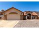 Attractive single-story home featuring a two-car garage and a terracotta tile roof at 307 Oak Canyon Dr, Henderson, NV 89015