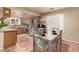 Eat-in kitchen with stainless steel appliances and cozy dining area at 307 Oak Canyon Dr, Henderson, NV 89015