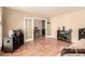 Open living room featuring tile flooring and double french doors at 307 Oak Canyon Dr, Henderson, NV 89015