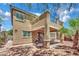 Charming backyard with covered patio, outdoor furniture, barbecue grill, and low maintenance landscaping at 3217 Bonassola Ave, North Las Vegas, NV 89031