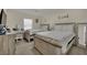 Bright bedroom features two beds, desk, and wall decor at 3217 Bonassola Ave, North Las Vegas, NV 89031