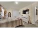 A bedroom featuring a bed, dresser, and string lights at 3217 Bonassola Ave, North Las Vegas, NV 89031
