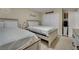 Bedroom featuring two beds, neutral walls, and ample closet space at 3217 Bonassola Ave, North Las Vegas, NV 89031