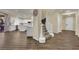 Spacious foyer with staircase, leading to an open kitchen and living area at 3217 Bonassola Ave, North Las Vegas, NV 89031