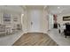 Open-concept entryway showcasing wood floors, natural light, and views to the dining room at 3217 Bonassola Ave, North Las Vegas, NV 89031