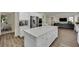Open concept kitchen with a large island and stainless steel appliances at 3217 Bonassola Ave, North Las Vegas, NV 89031