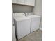 Bright laundry room features a washer and dryer at 3217 Bonassola Ave, North Las Vegas, NV 89031