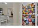 Walk-in pantry featuring organized shelving with a variety of food items and cooking essentials at 3217 Bonassola Ave, North Las Vegas, NV 89031
