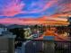 Scenic neighborhood view at sunset with a beautiful array of blue, pink, and orange hues at 3217 Bonassola Ave, North Las Vegas, NV 89031