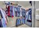 Spacious walk-in closet with ample hanging storage and shelving at 3217 Bonassola Ave, North Las Vegas, NV 89031