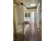 Bathroom with double vanity, bathtub, shower, and wood flooring at 3394 Brookfield Dr, Las Vegas, NV 89120