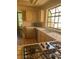 Kitchen with tile countertops and an island cooktop at 3394 Brookfield Dr, Las Vegas, NV 89120